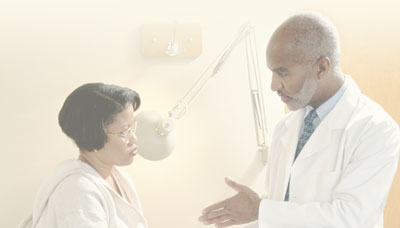 Physician talking to patient.